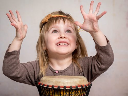 Cute-Little-Girl-Playing-Drum-sc